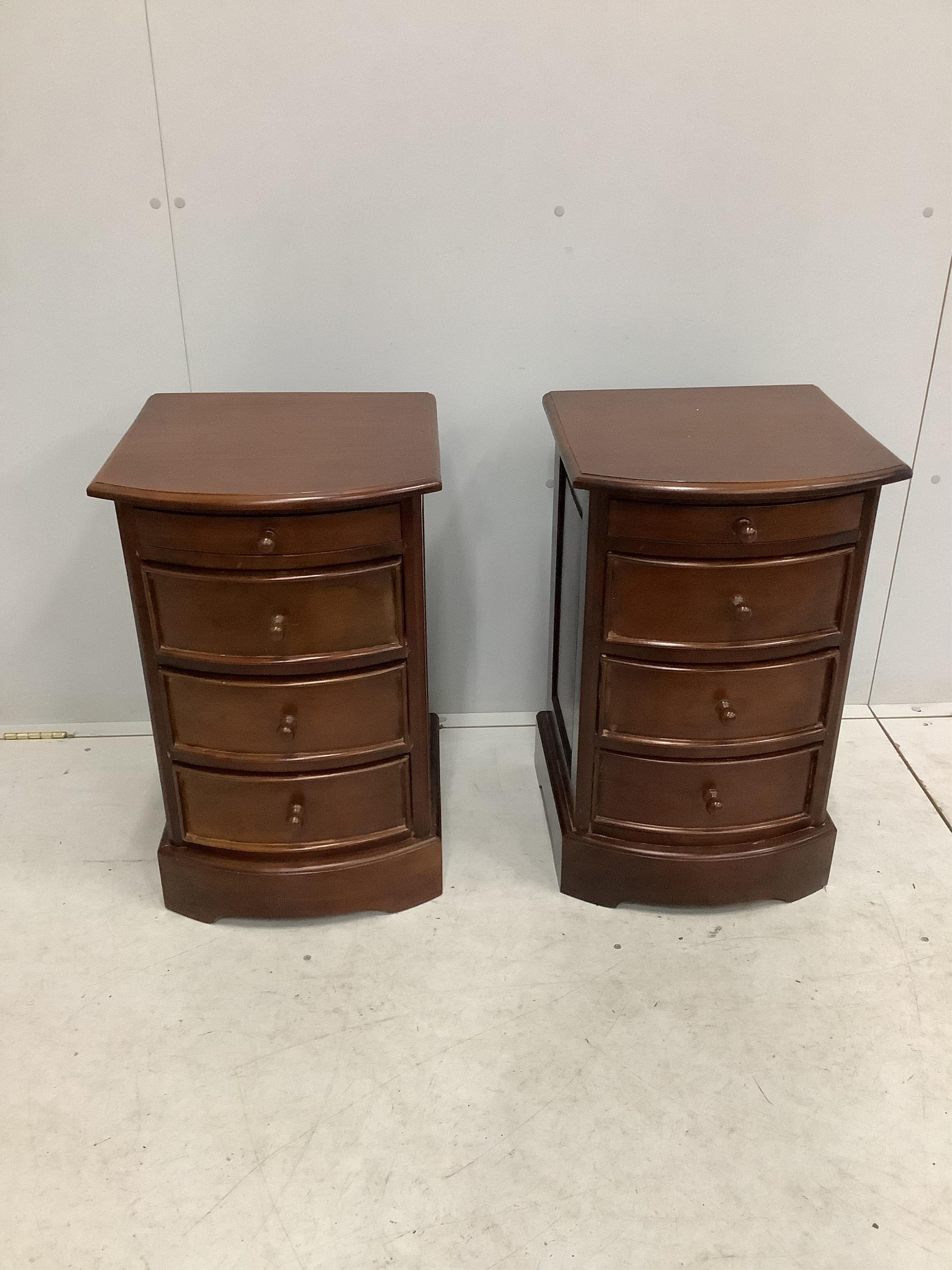 A pair of reproduction mahogany bow front four drawer bedside chests, width 42cm, depth 44cm, height 67cm. Condition - fair